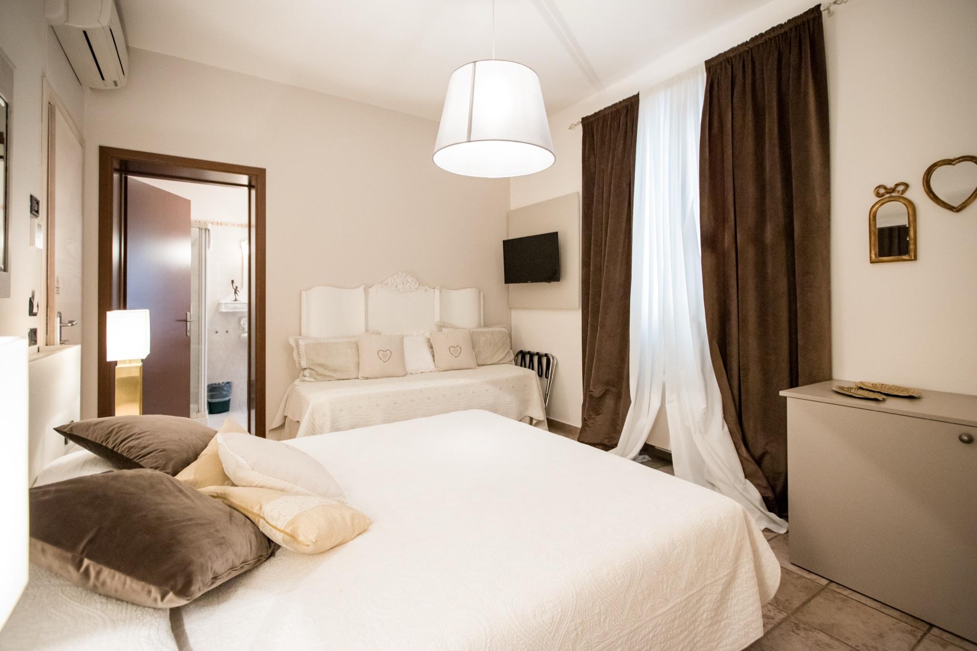 Camera Standard luminosa con letto singolo aggiuntivo